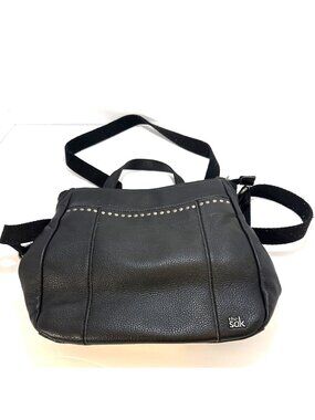 The Sak Black Leather Backpack Crossbody with Mint‎ Patterned Interior